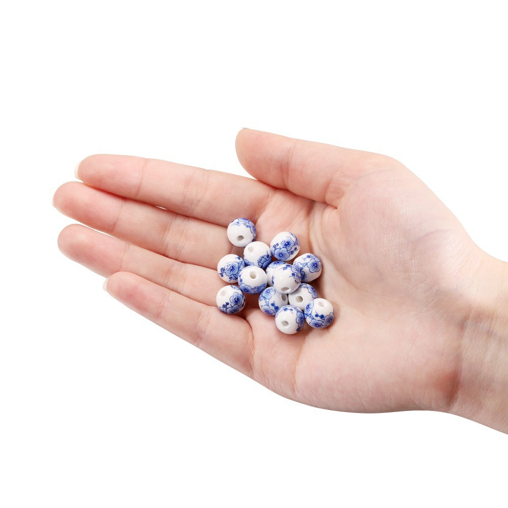 Al por mayor 10pcs/paquete de colgantes de ciruela de cerámica de estilo chino cuentas de cuerda de bricolaje de bricolaje